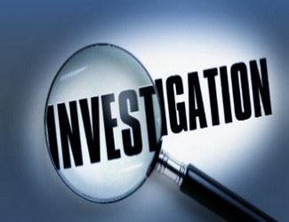 Loupe pointant sur le mot investigation